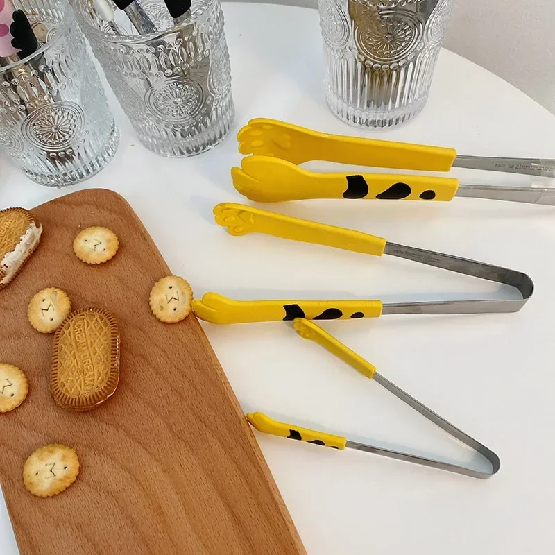 القط باو شكل ملقط طعام لطيف ال - مراجعة Kitchen Gadgets New 2025 وسعره